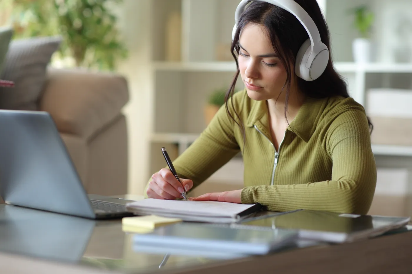 Student listening practice with headphones